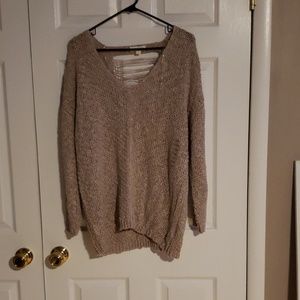 Loose fit, open back sweater